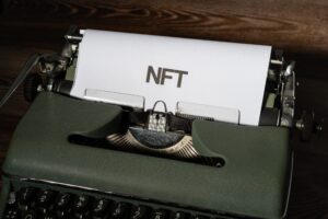 NFT word on typewriter